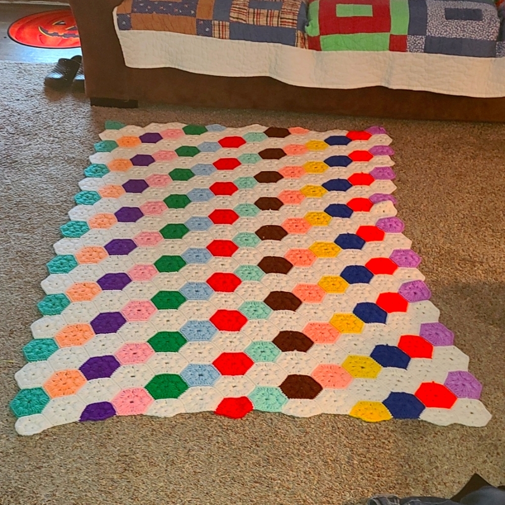 Vintahe Crocheted beautifully coverlet for a bed or a couch. No damage or snags.